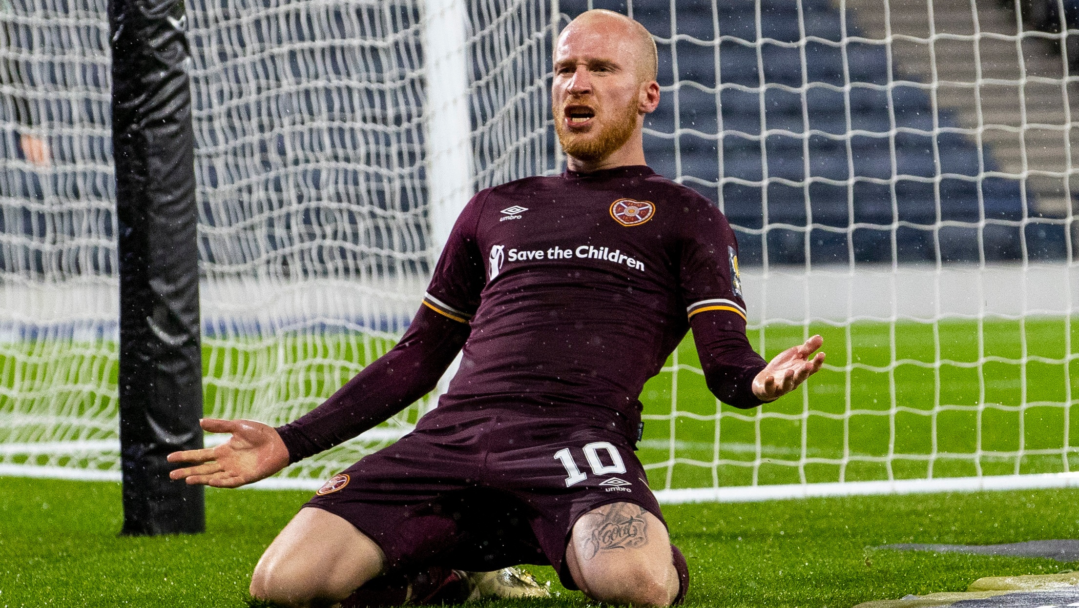 Liam Boyce celebrates after putting Hearts 2-1 up in the semi-final.