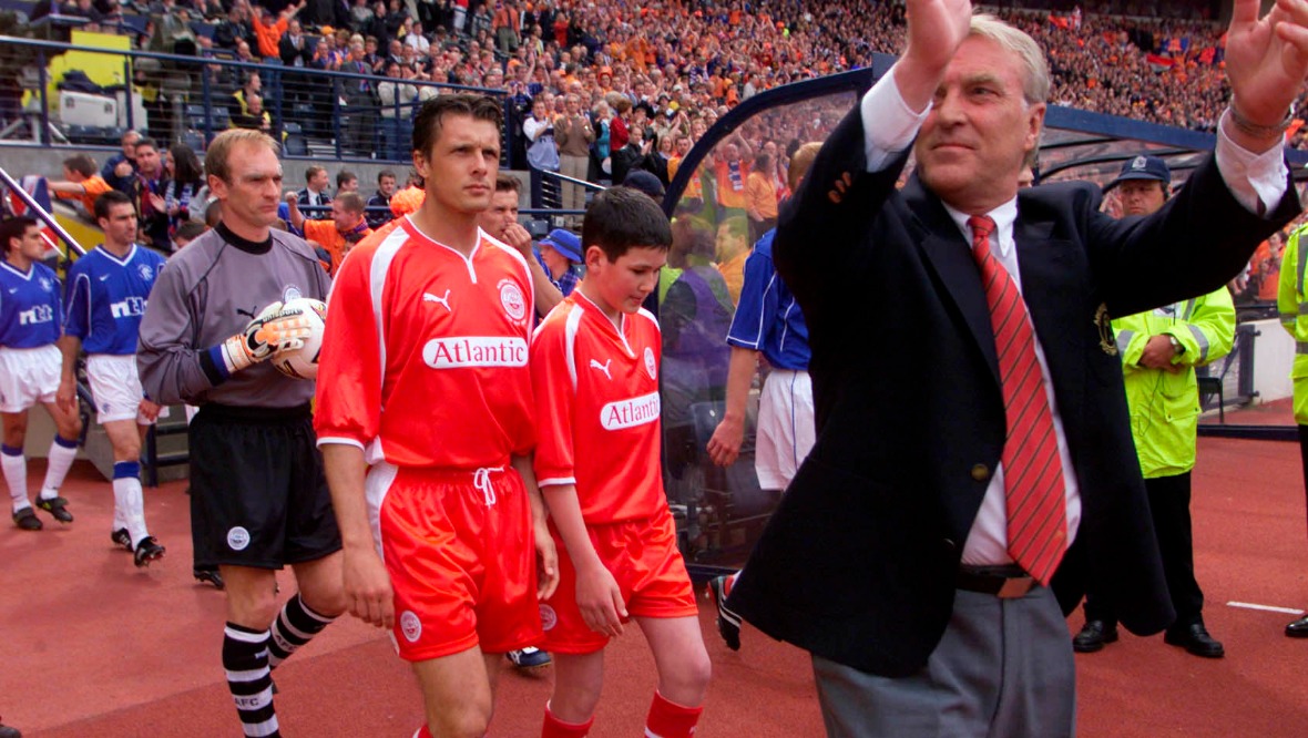 Ebbe Skovdahl leads Aberdeen out for a Scottish Cup final against Rangers in 2000.