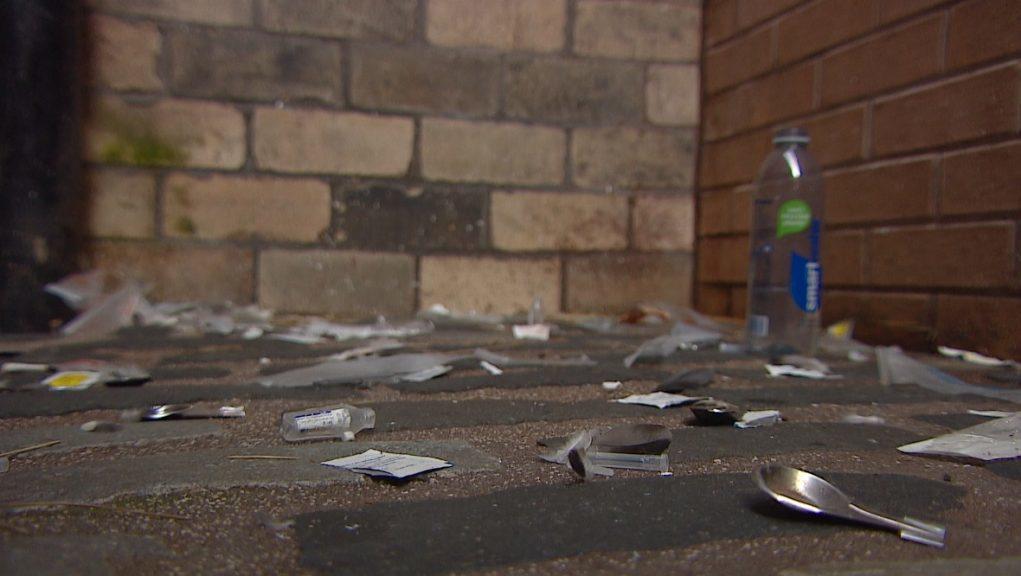 Dangerous: A Glasgow alleyway littered with drug paraphernalia.