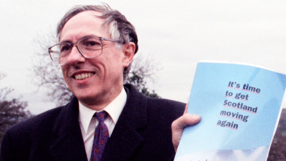 Donald Dewar unveils a Labour manifesto. 