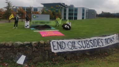 Extinction Rebellion protesters dump manure at BP offices