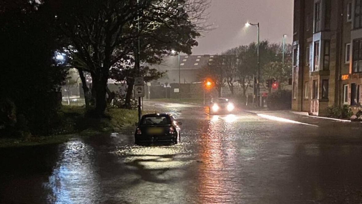 Homes evacuated and cars stranded amid flooding chaos