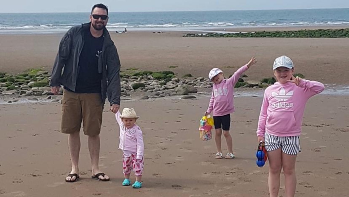 Family: Mr Carmichael with his three daughters.