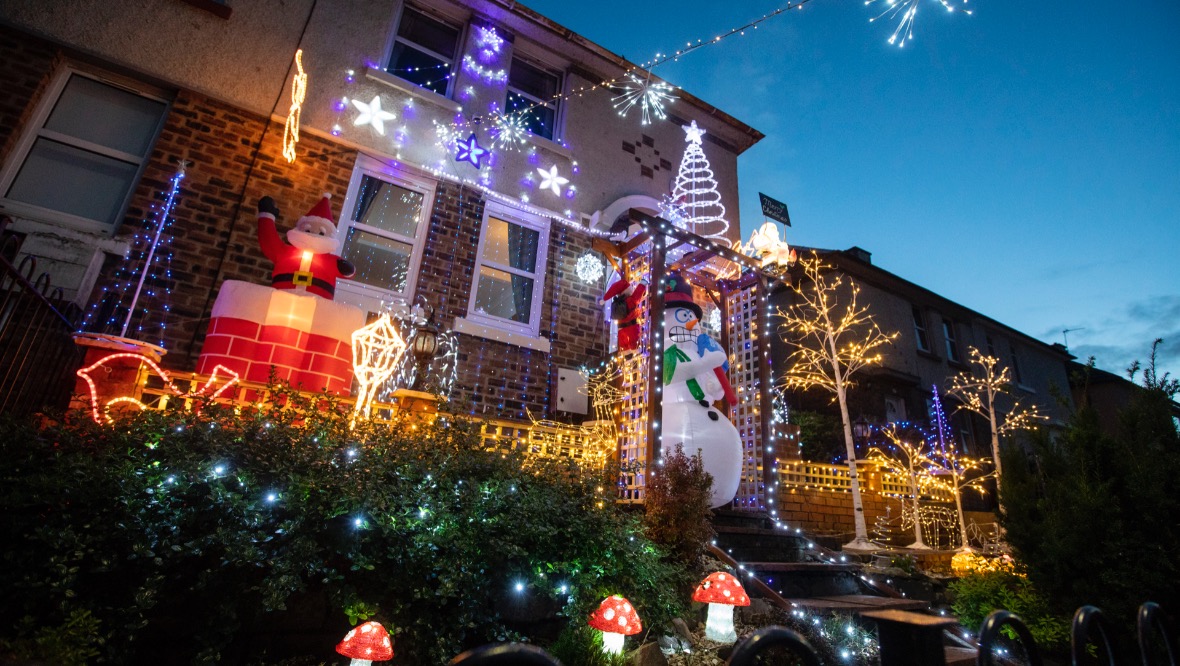 Ian decided to illuminate his Hamilton home on October 1. SWNS.