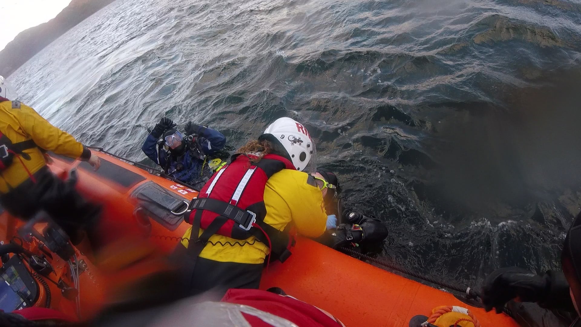 The lifeboat picked the divers out of the water.