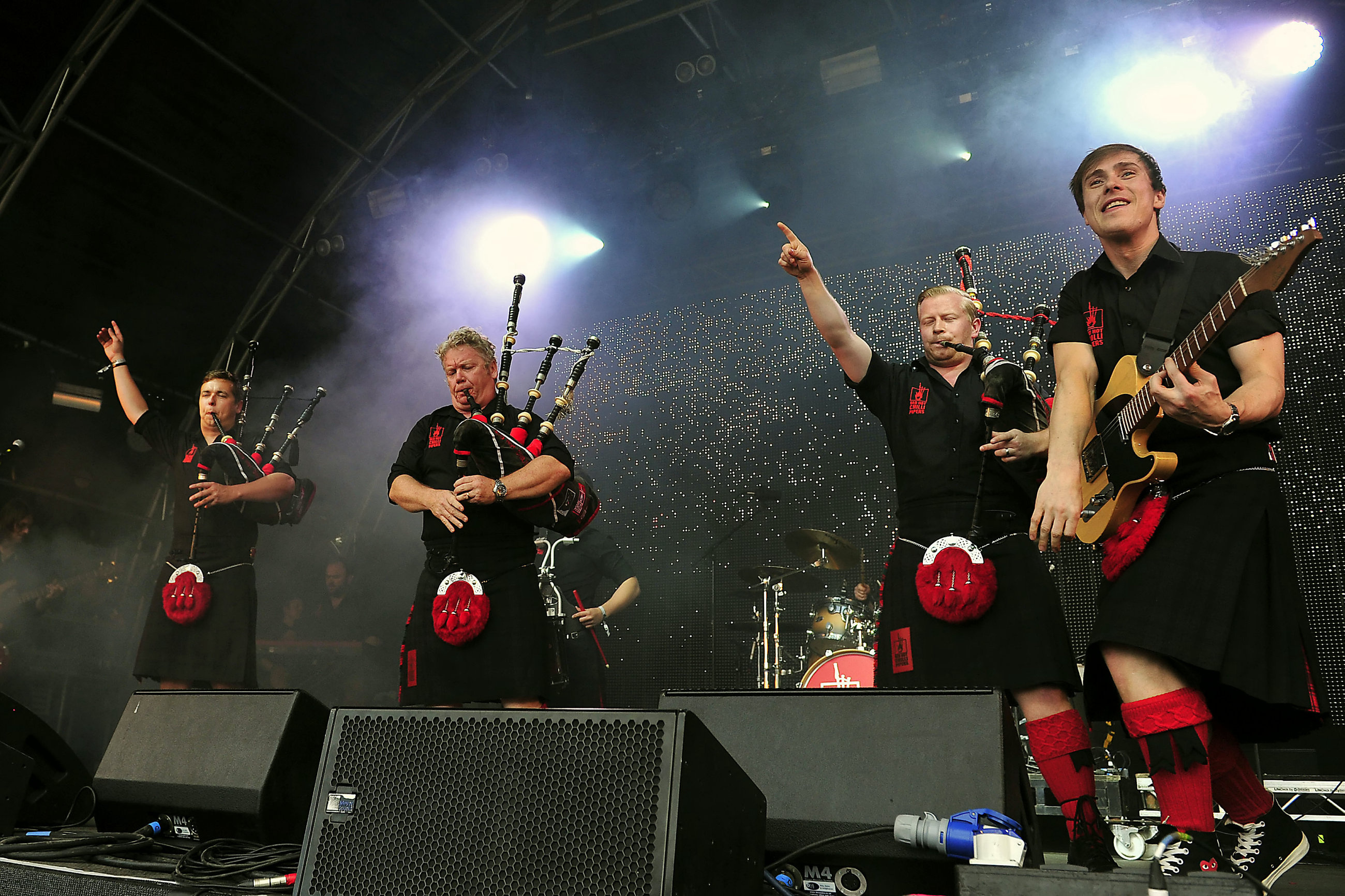 The Red Hot Chilli Pipers performing at McEwan's Party at the Palace music festival.