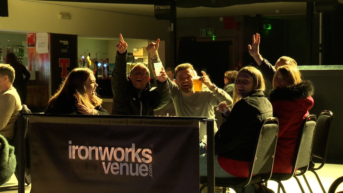 Live music: Gig-goers enjoy themselves at the socially distanced concert. 