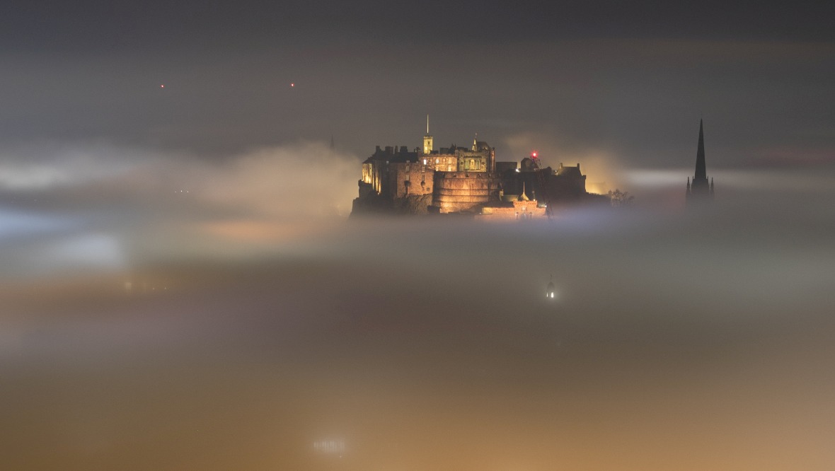 Edinburgh Castle emerges from fog in stunning picture