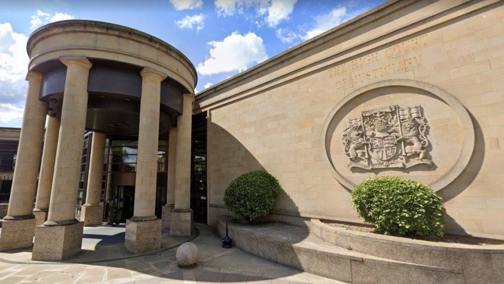 Man who served as a police officer allegedly raped sleeping woman.