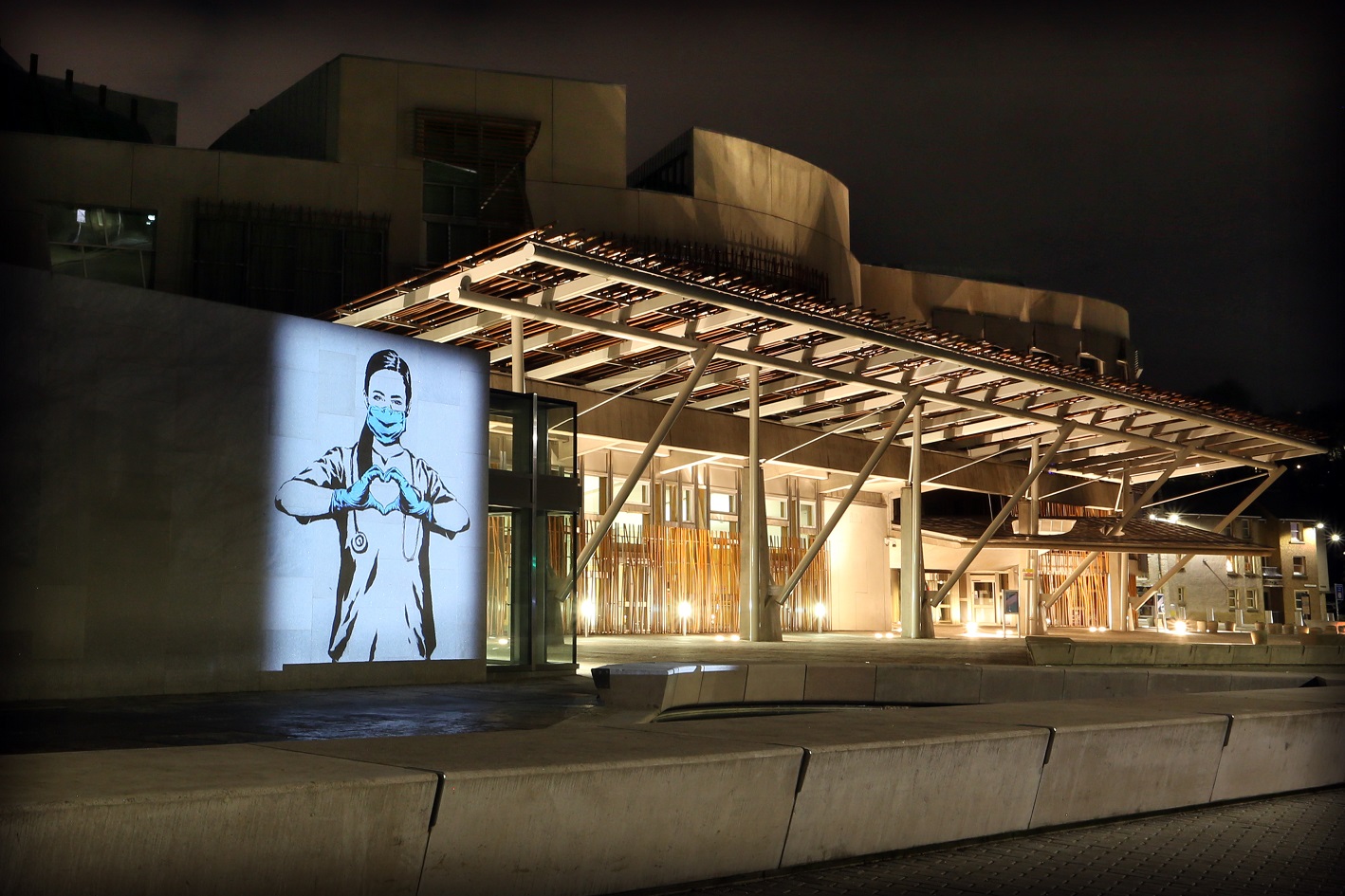 Rebel Bear image projected on to the Scottish Parliament.