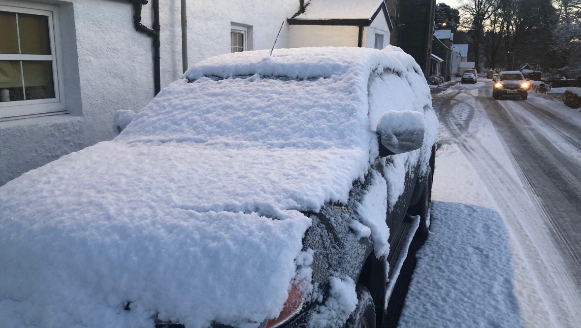 Scots wake up to snow and ice following weather warning