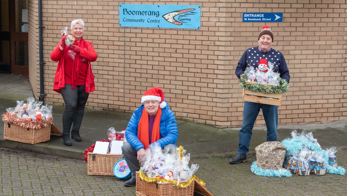 The Boomerang Club: The lotto winners jumped at the opportunity to help out.