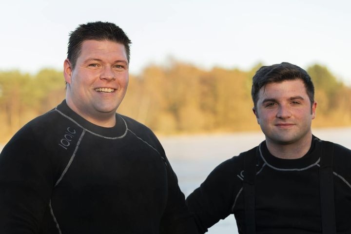 Heroes: Two firefighters braved the freezing water to save the bird.