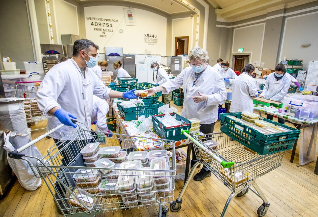 Volunteers deliver nearly half a million free meals