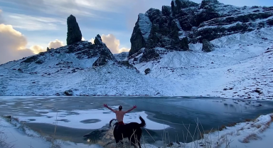 An ice day for a dip with your dog in a freezing loch