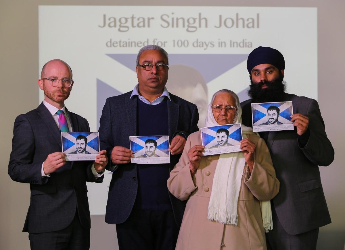 Martin Docherty-Hughes MP with Jagtar's father, his maternal grandmother and brother Gurpreet.
