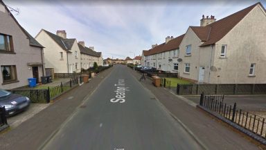 Men armed with hammer and knife attack couple in their home