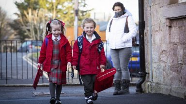 ‘Beaming smiles’ as young pupils return to school