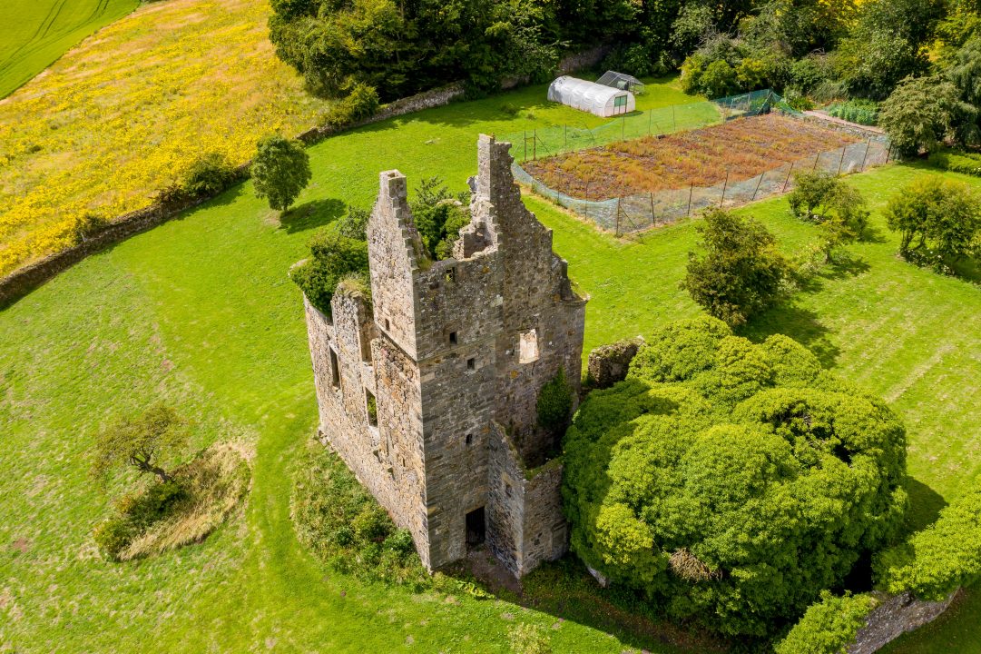 Ruined castle with tennis court could be yours for £225,000