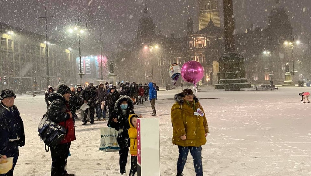 Glasgow: Images of people queuing in the snow prompted an outpouring of support. 