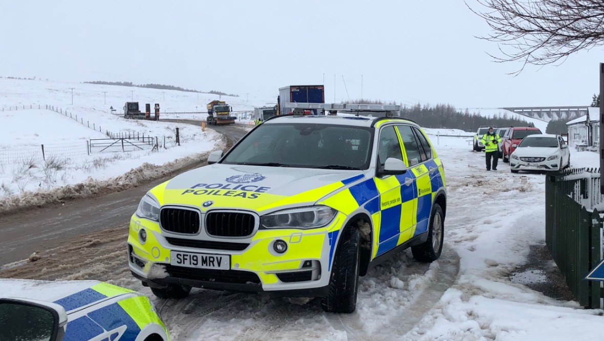 Police on the scene of the stranded cars.