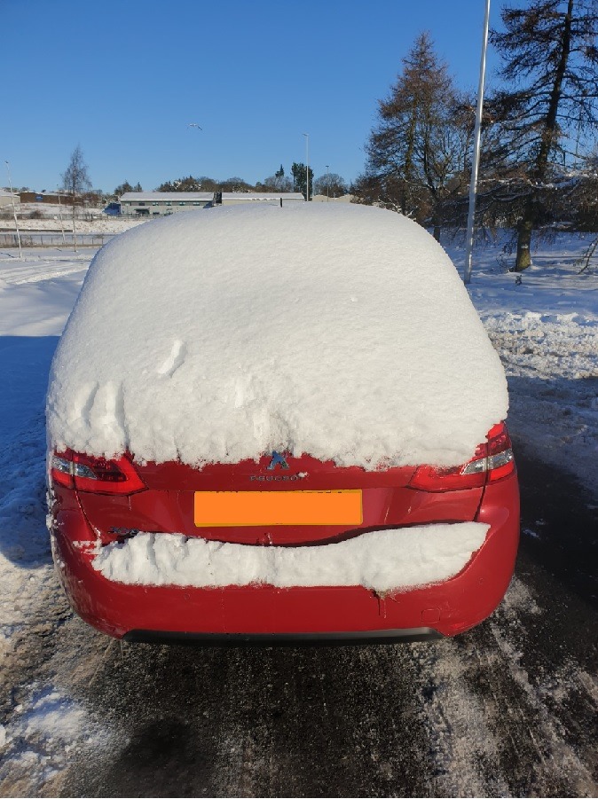A layer of snow covered the rear windscreen (Police Scotland).