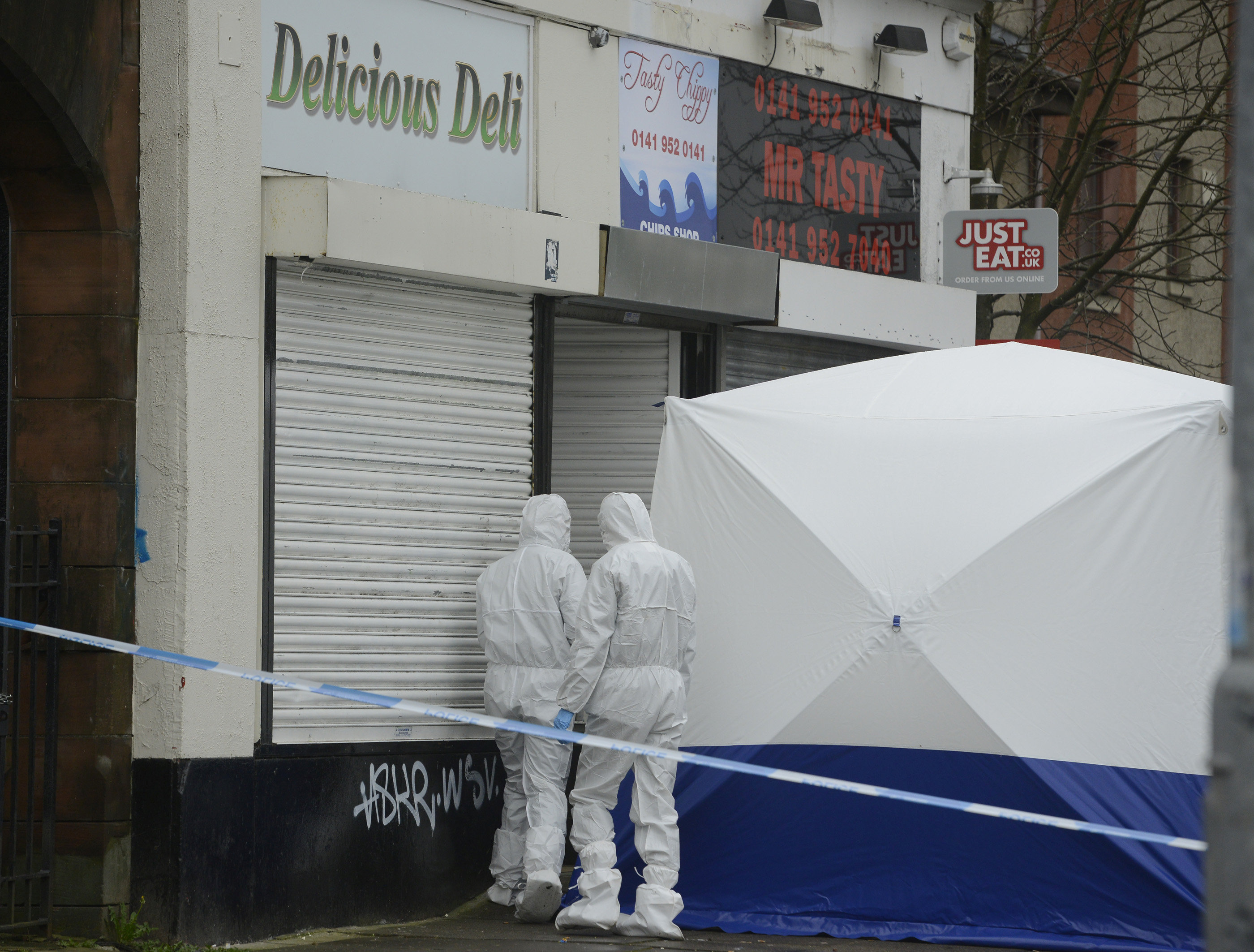  Forensics teams outside Delicious Deli after Paige was found dead.