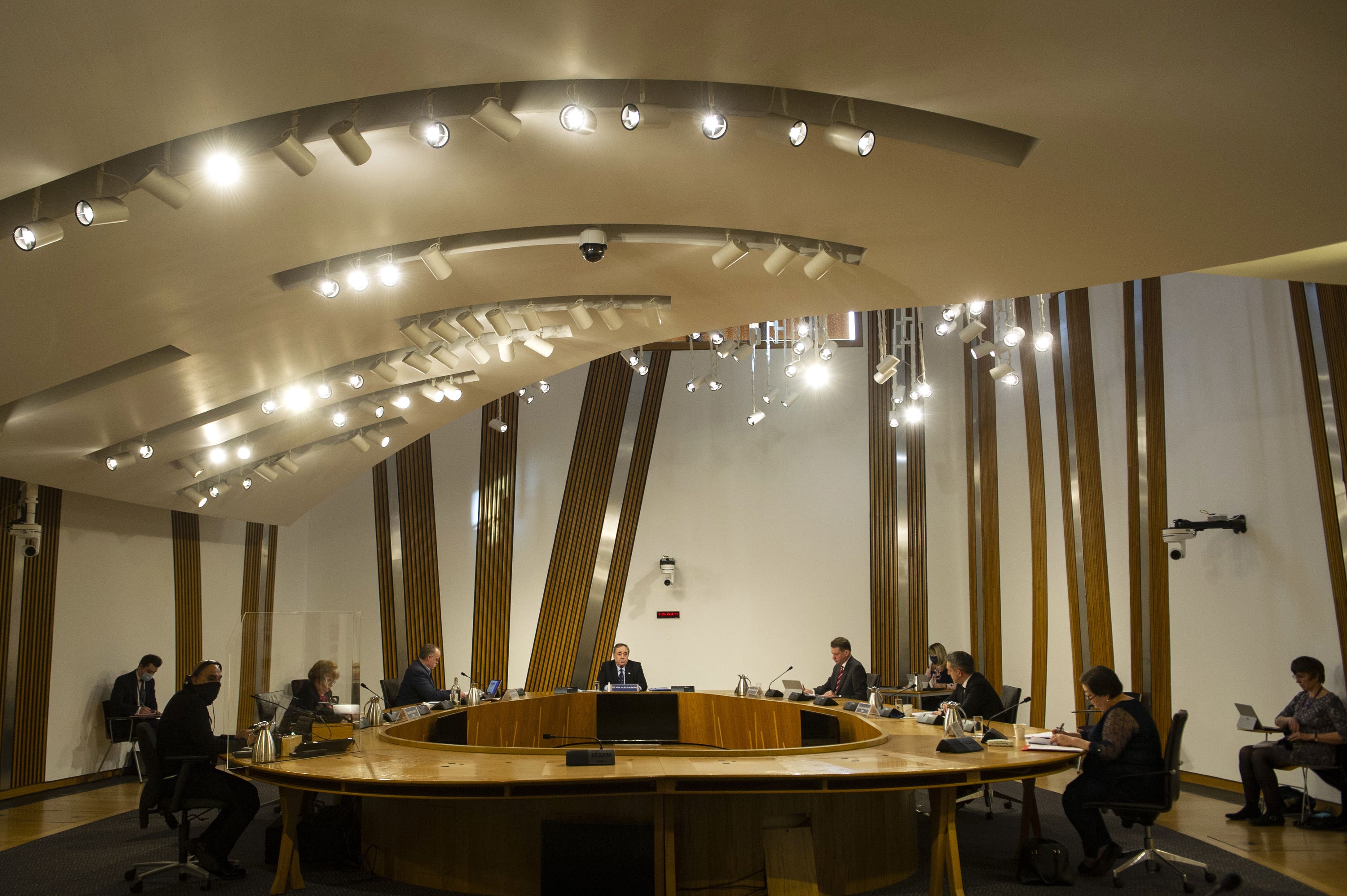 <em>Former first minister Alex Salmond (centre) giving evidence to the Holyrood committee last week (Andy Buchanan/PA)</em>” /><cite class=
