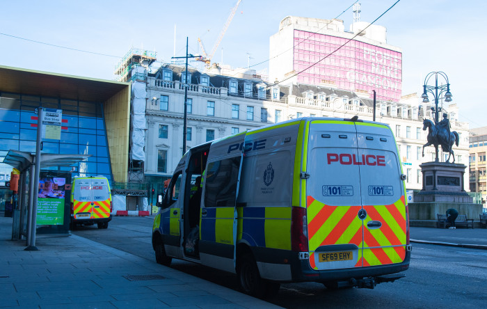 Police vans at George Square after the Old Firm derby at Celtic Park, on March 21, 2021, in Glasgow. (Craig Foy/SNS Group)