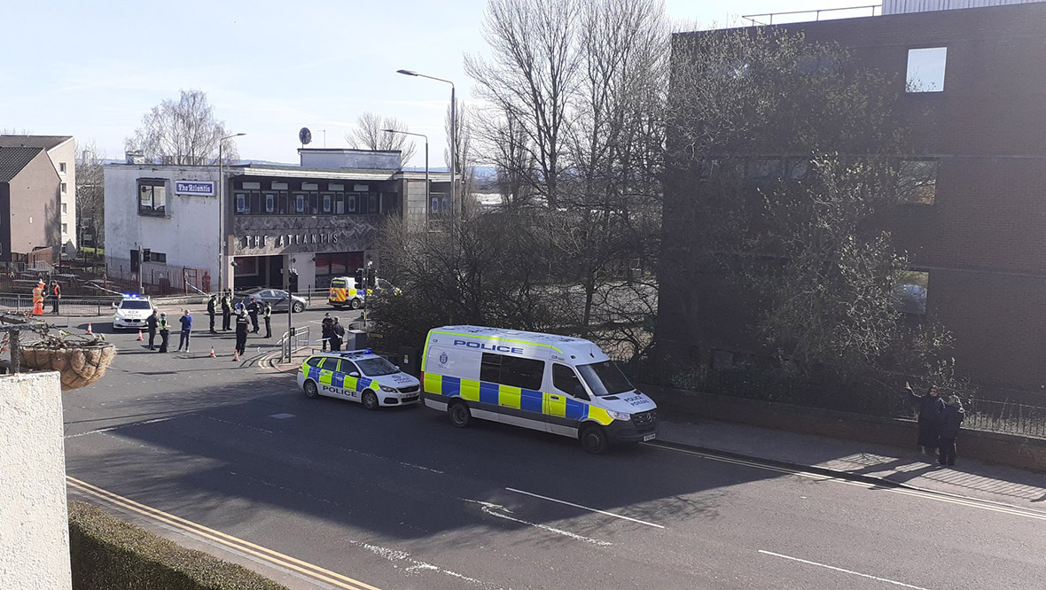 Man arrested after bomb squad probe package and station closed