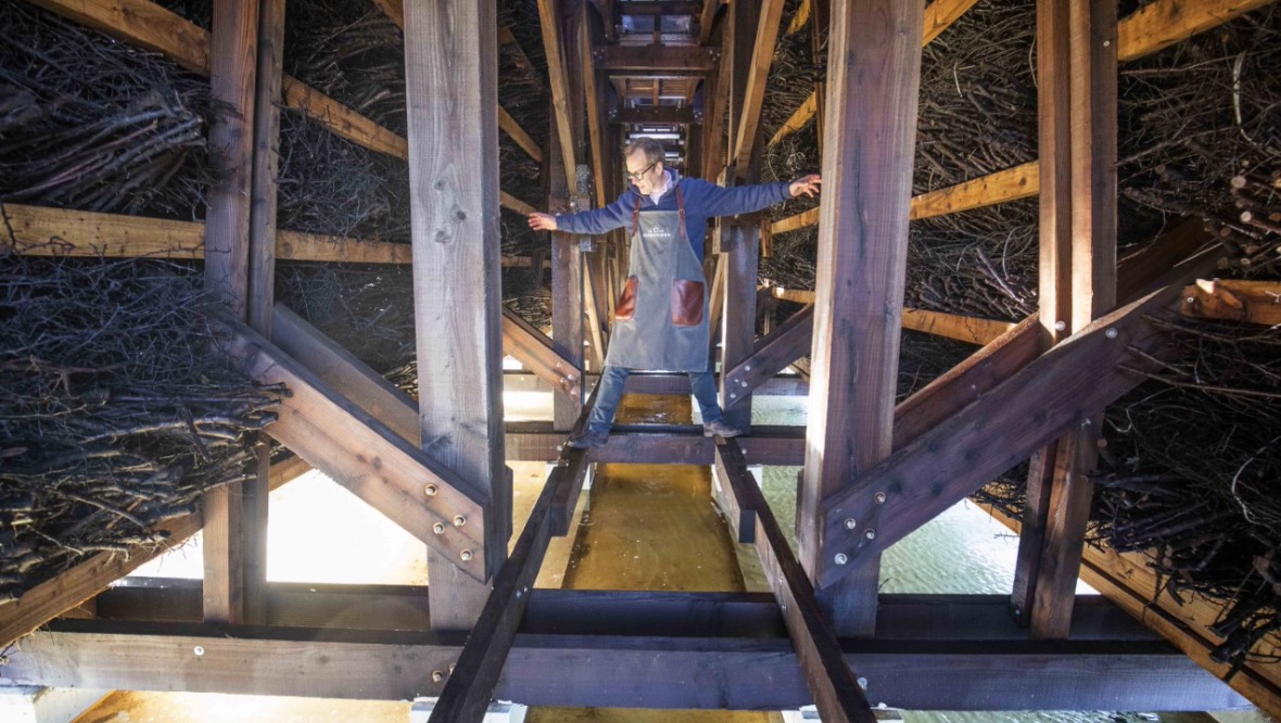 Master salter: Gregorie Marshall inside the A-frame of the salt graduation tower.