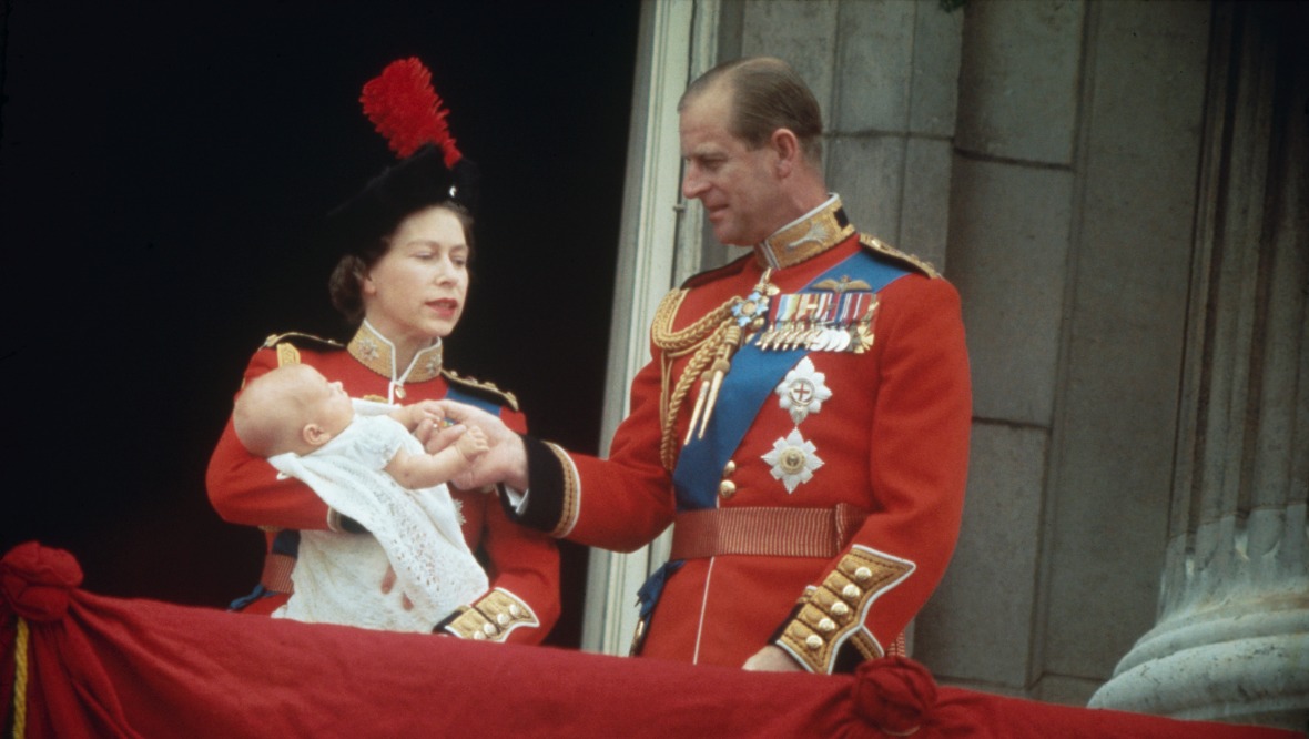 Queen Elizabeth II and Prince Philip with their baby son, Prince Edward on the balcony at Buckingham Palace, during the Trooping of the Colour, London, June 13 1964.
