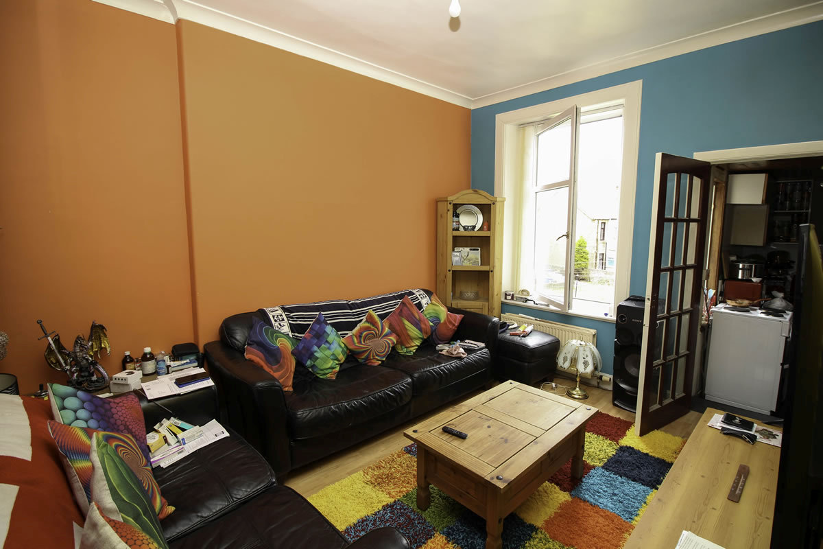 The modest flat is described as an 'investment opportunity'.