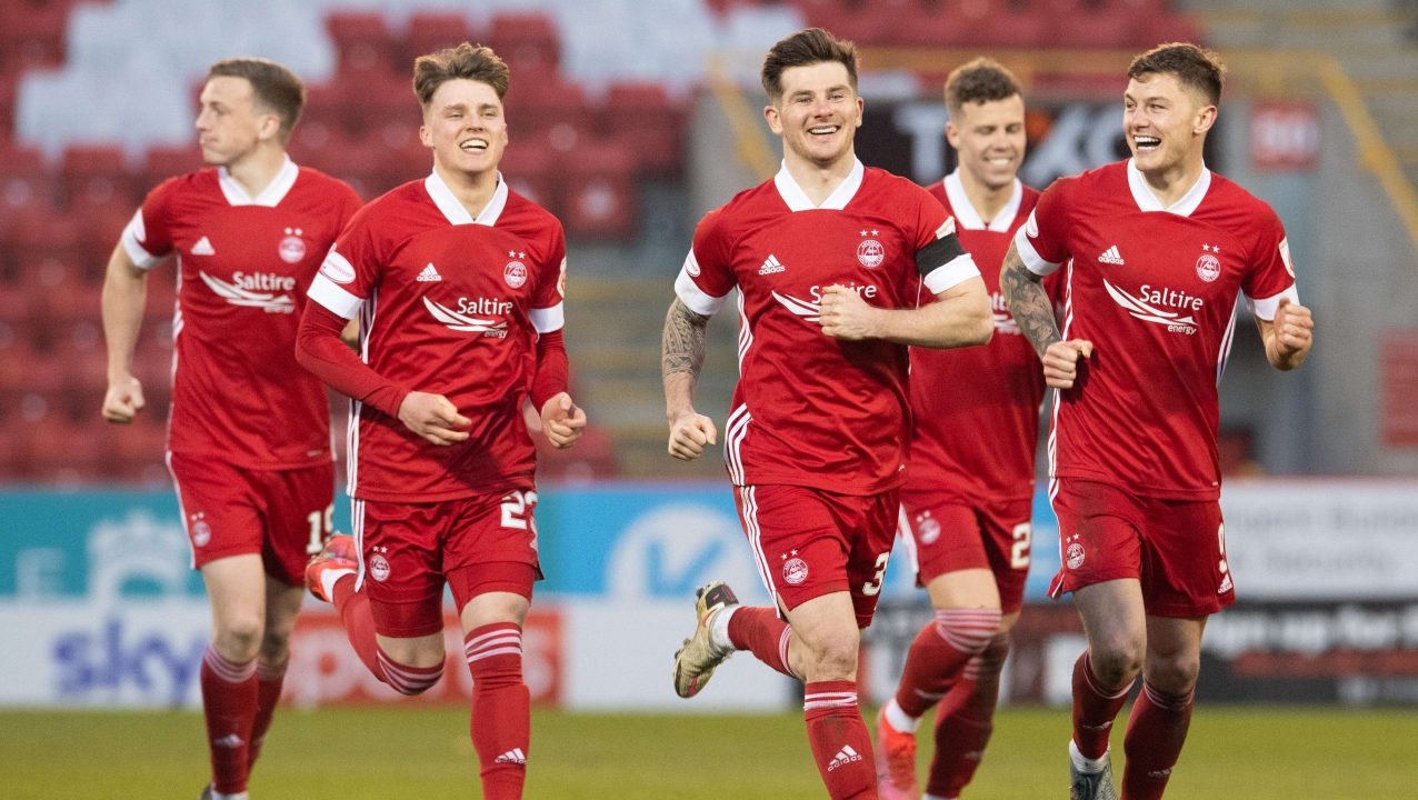 Aberdeen beat Livingston on penalties to give Glass winning start