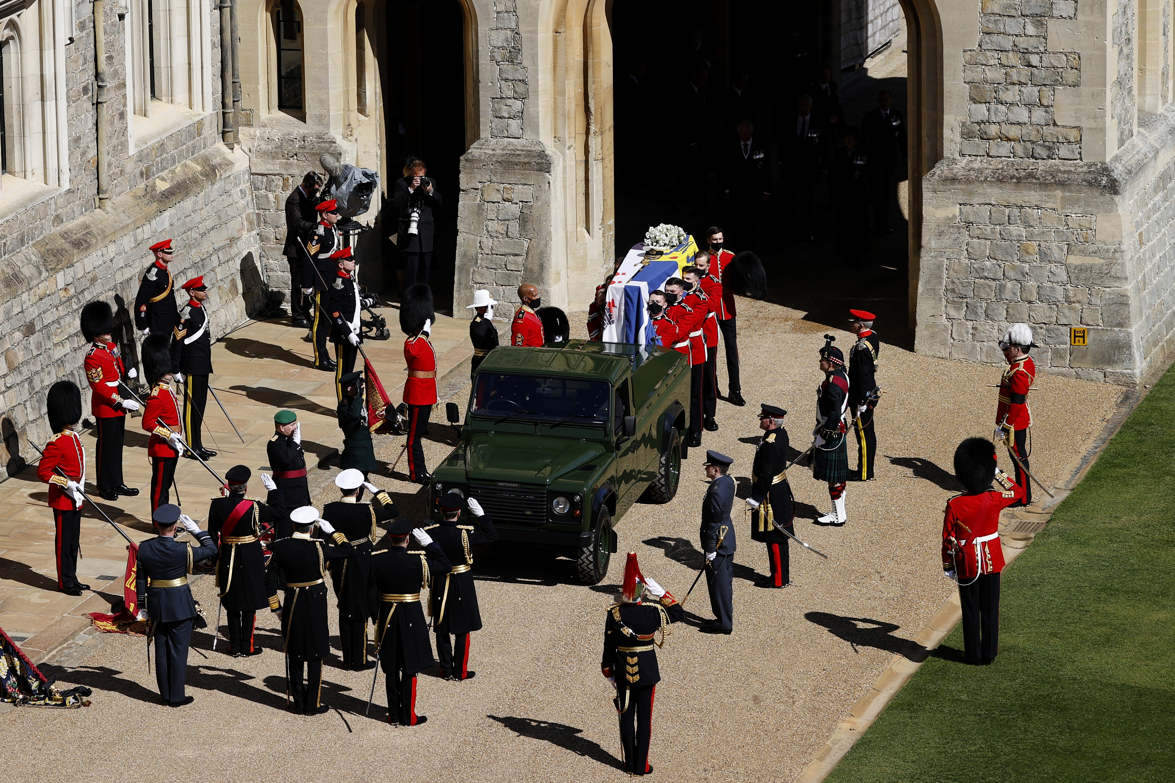 The Duke of Edinburgh’s coffin is carried to the purpose built Land Rover during the funeral.