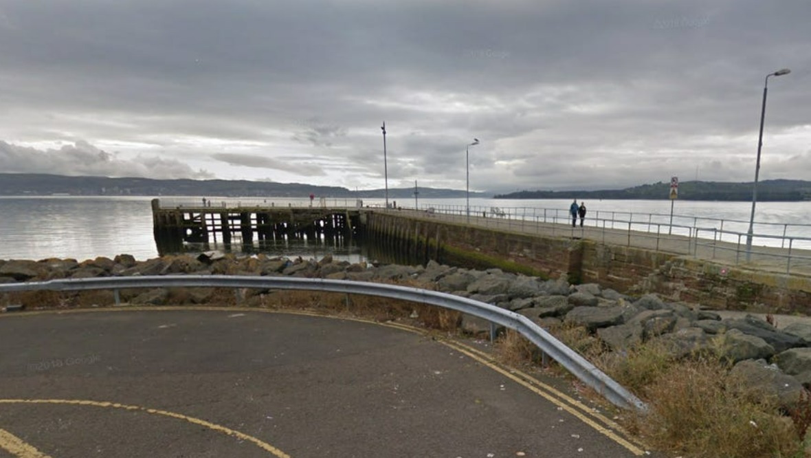 Woman dies after getting into difficulty in water at pier