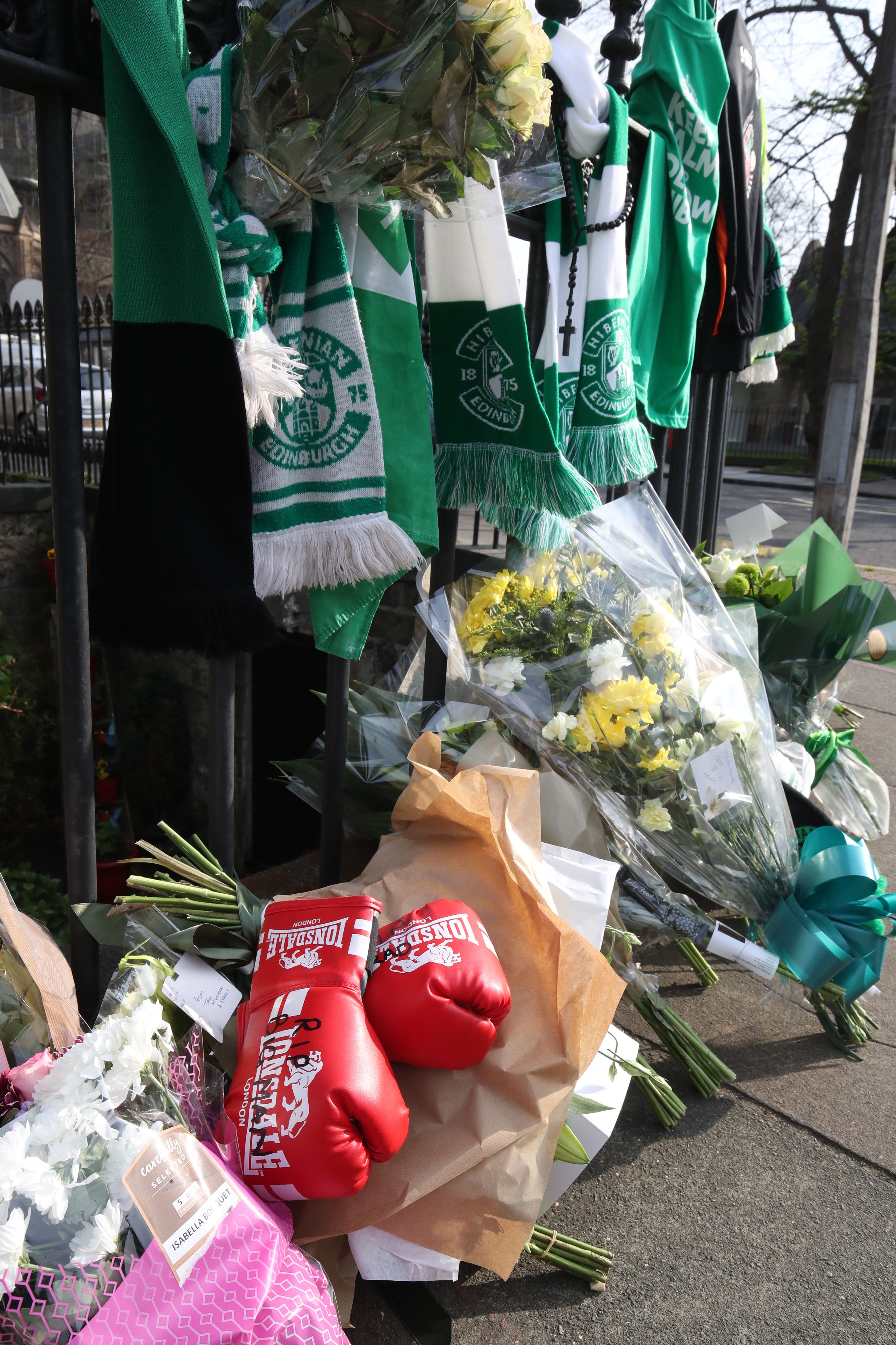 Floral tributes were left at the scene where Bradley Welsh was shot (Jane Barlow/PA)