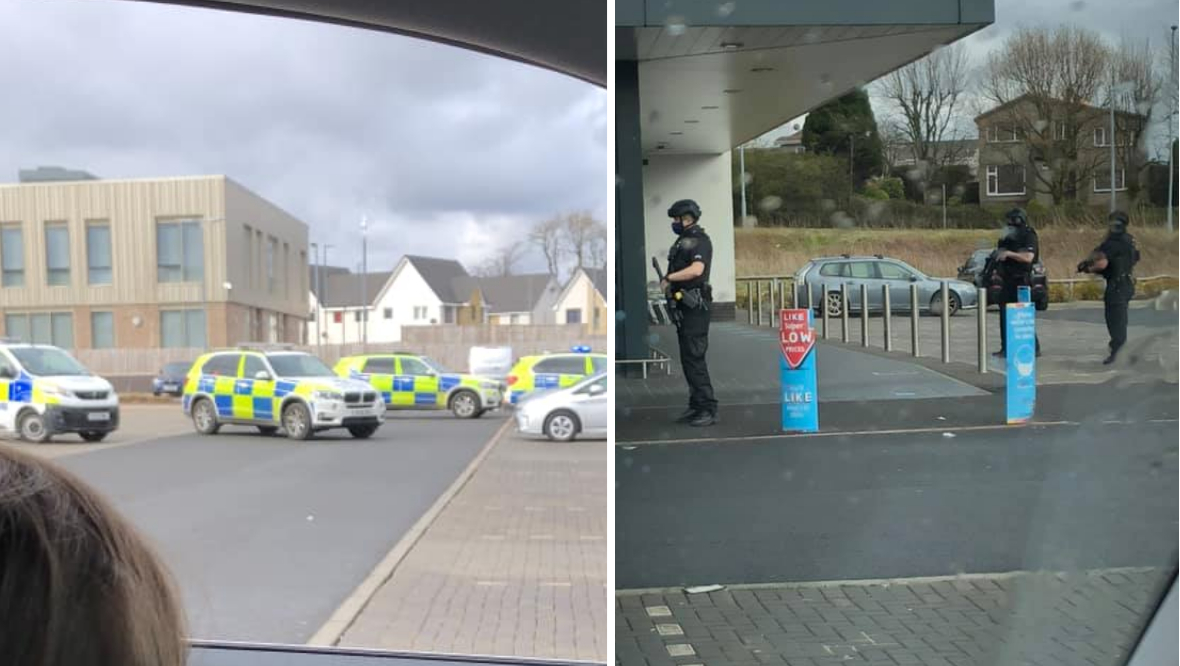 Armed police lockdown supermarket amid hunt for driver
