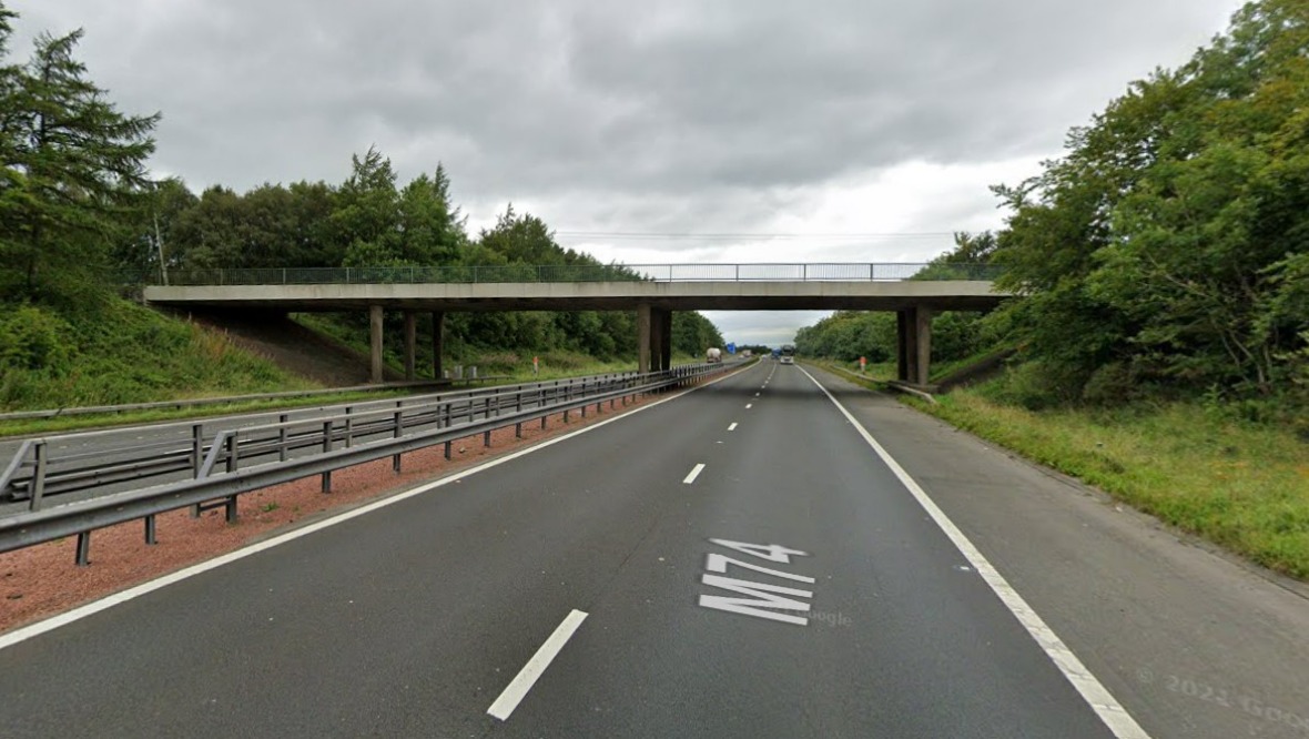 Appeal after vehicle struck by item thrown from bridge on M74