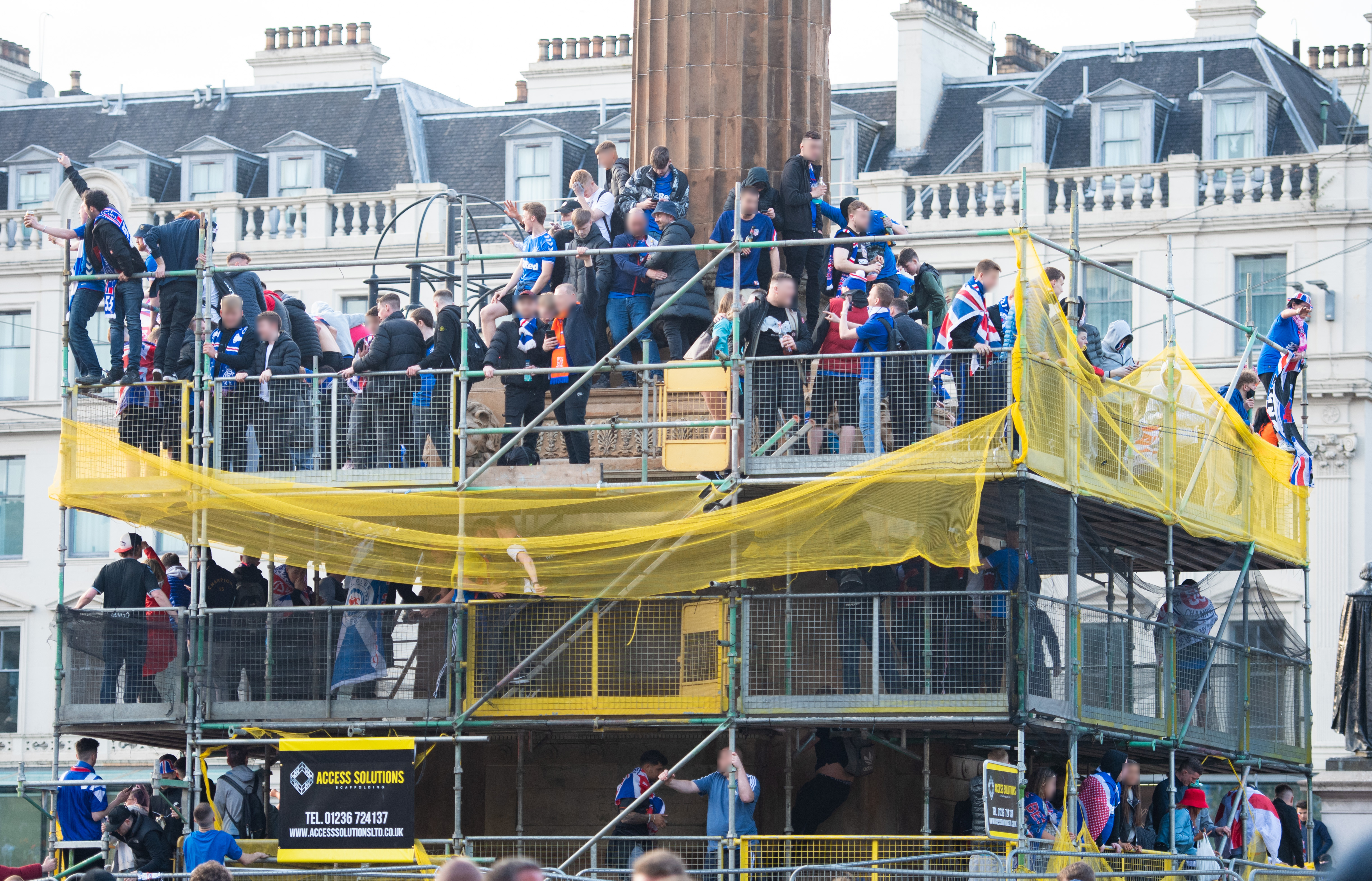 GLASGOW, SCOTLAND - MAY 15: Rangers fans celebrate lifting the Scottish Premiership title  at George Square, on May 15, 2021, in Glasgow, Scotland. (Photo by Euan Cherry / SNS Group)