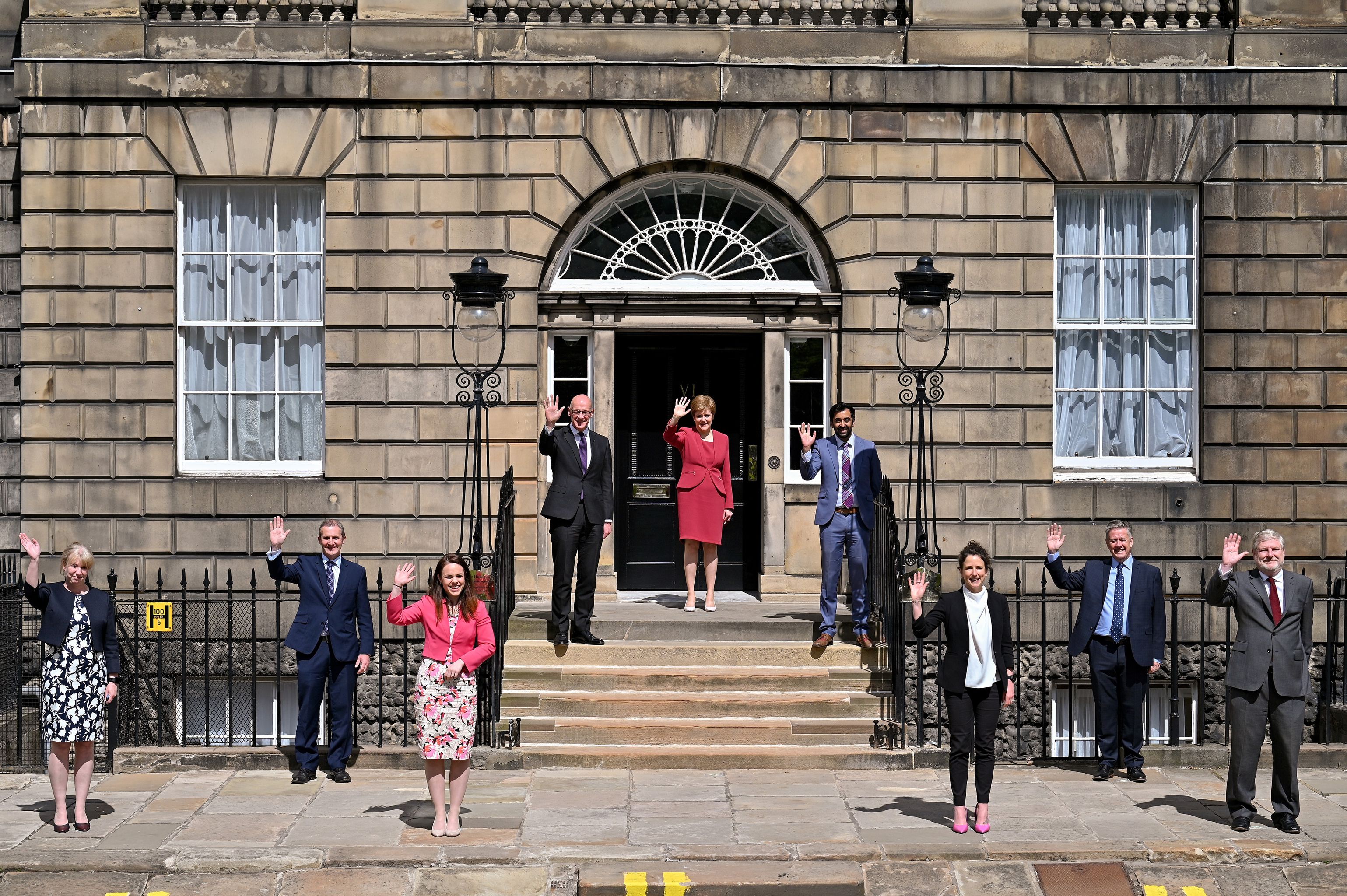 First Minister Nicola Sturgeon poses with her new cabinet outside Bute House.