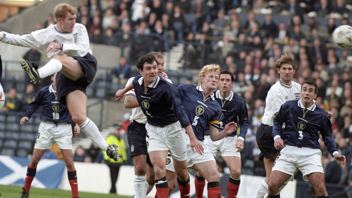 Paul Scholes directs his header into the Scotland net to give England the lead.