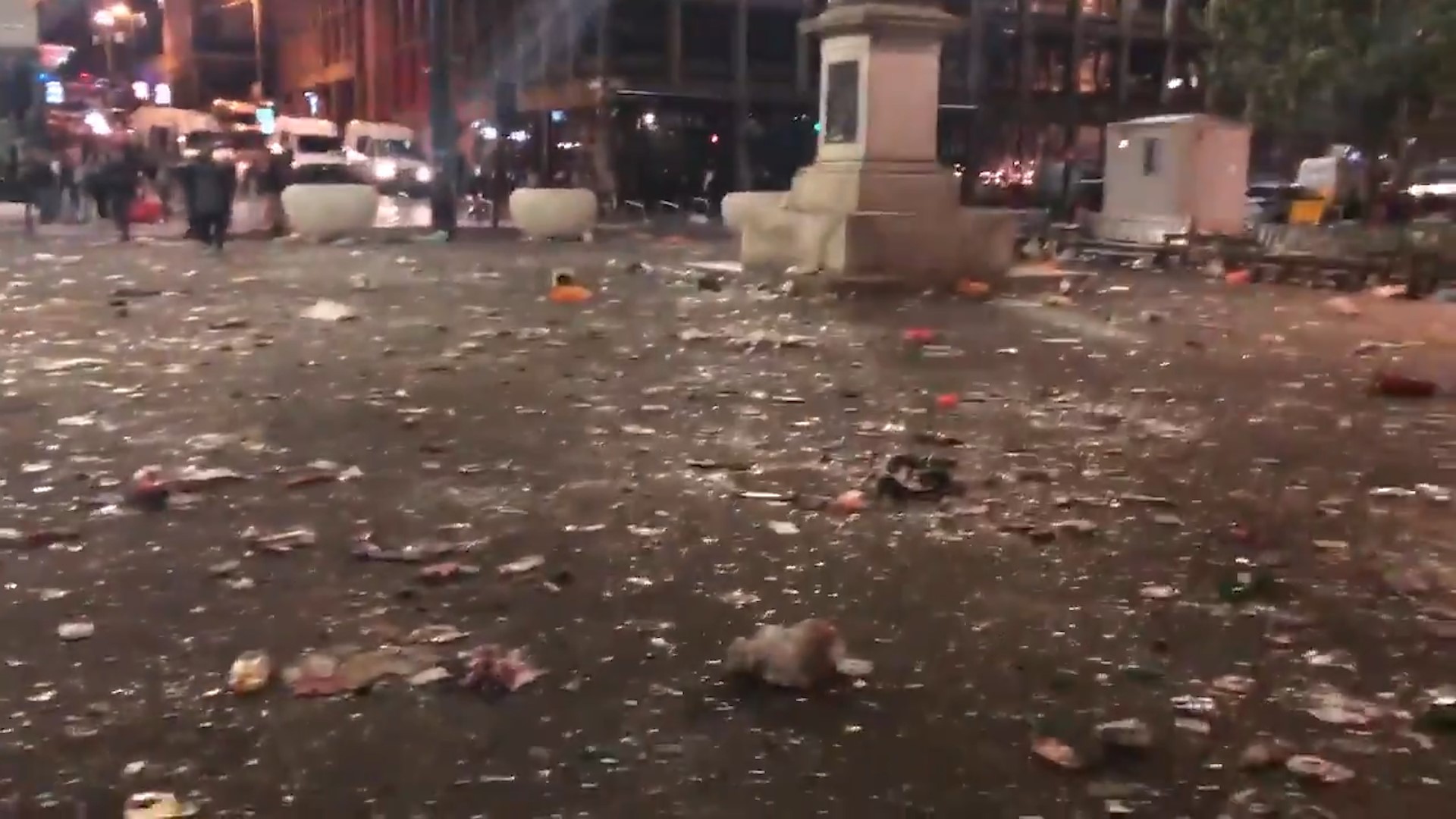 George Square was littered with broken glass, alcohol containers, spent flares and other rubbish.