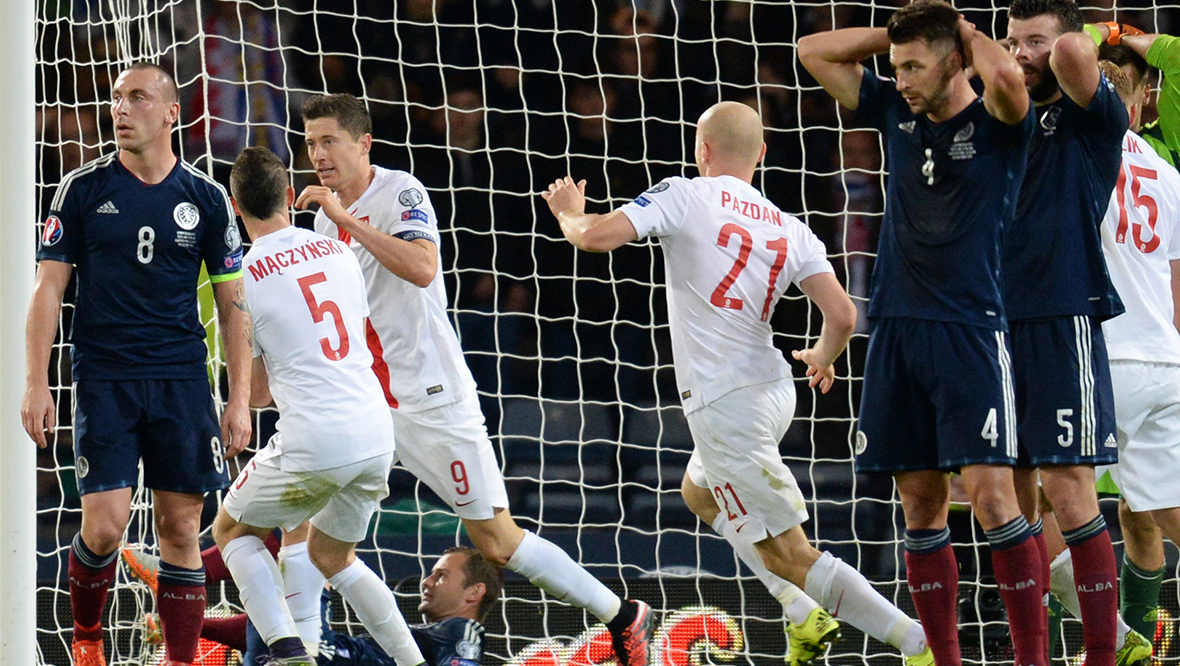 Robert Lewandowski celebrates his last-gasp equaliser.