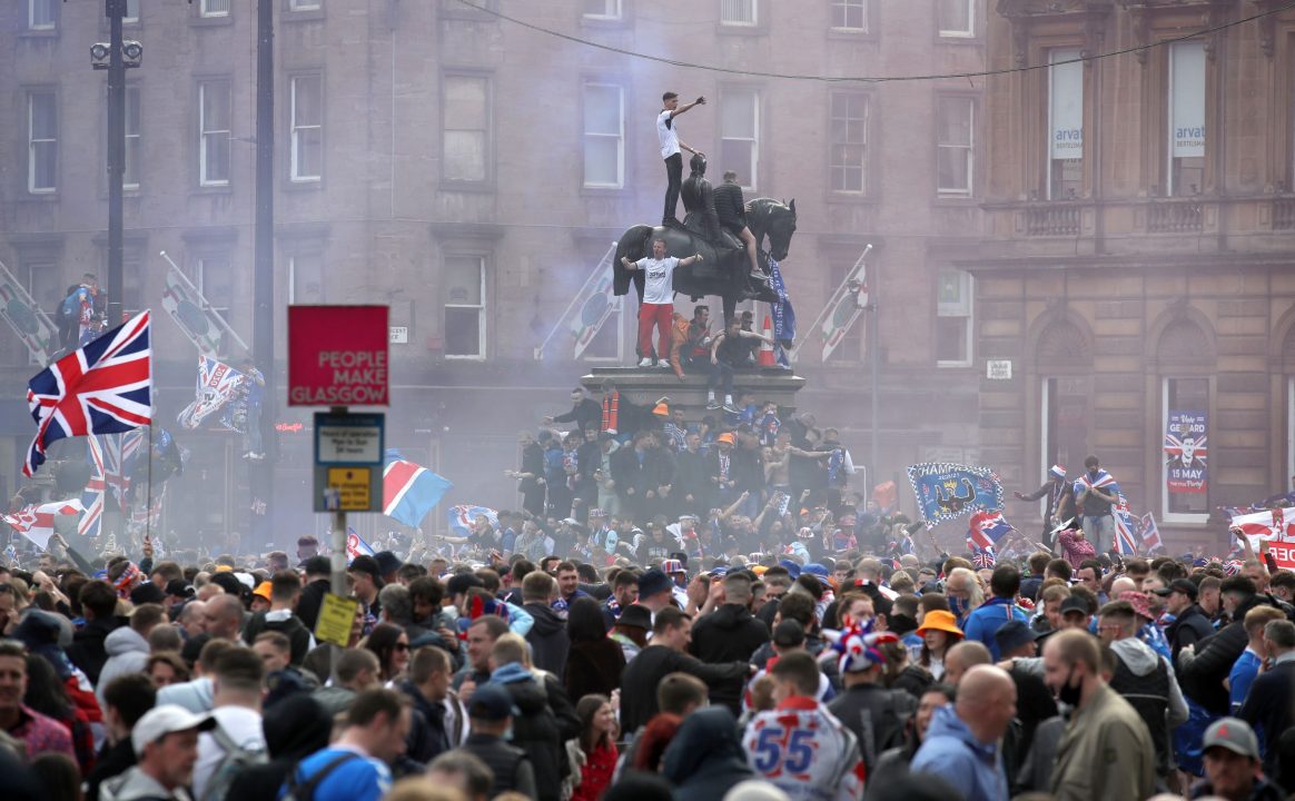 Policeman fined after joining Rangers fans in George Square