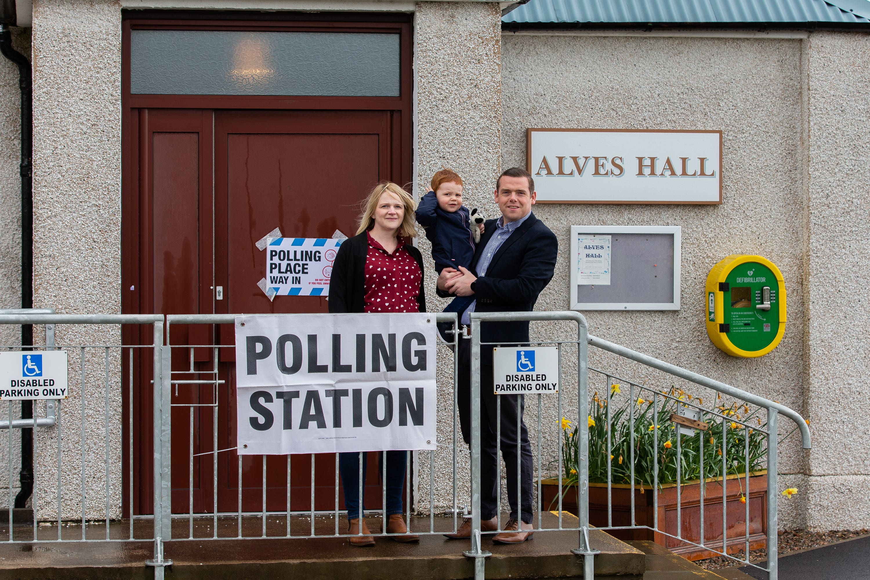 Scottish Conservative leader Douglas Ross and family at their polling station in Moray.