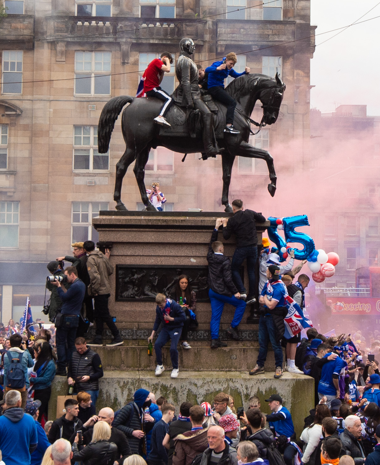 Rangers fans celebrate lifting the Scottish Premiership title at George Square (Euan Cherry/SNS Group)