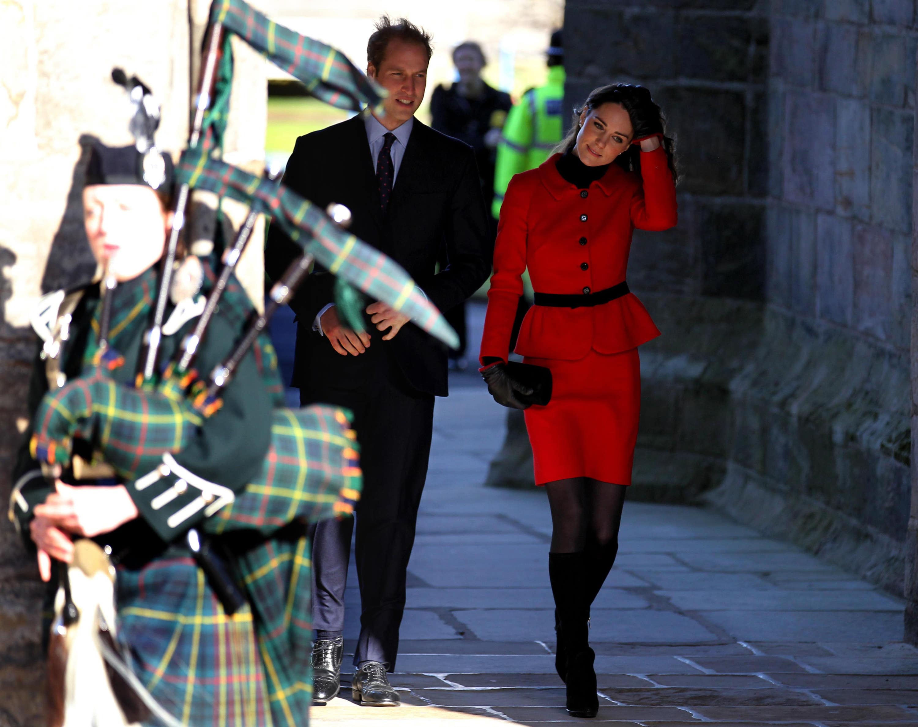 Prince William and Kate Middleton leave the Quadrangle during a return visit to the University of St Andrews in 2011 (Andrew Milligan/PA)