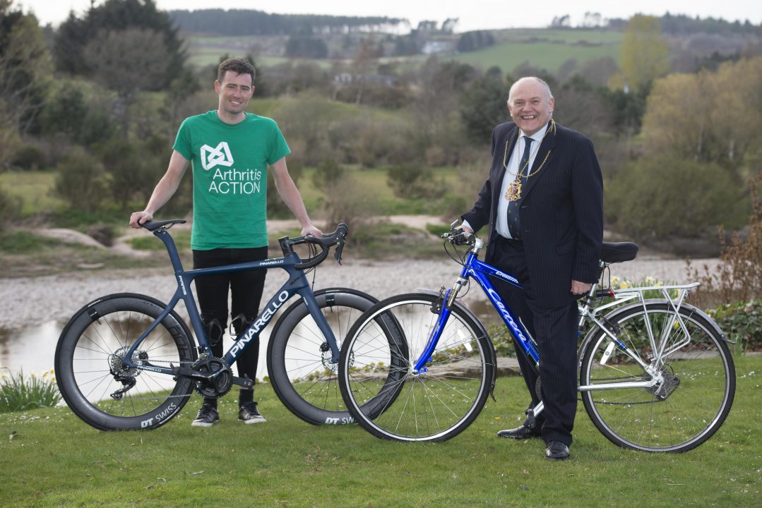 Cyclist raises £10,000 for arthritis charity in record attempt