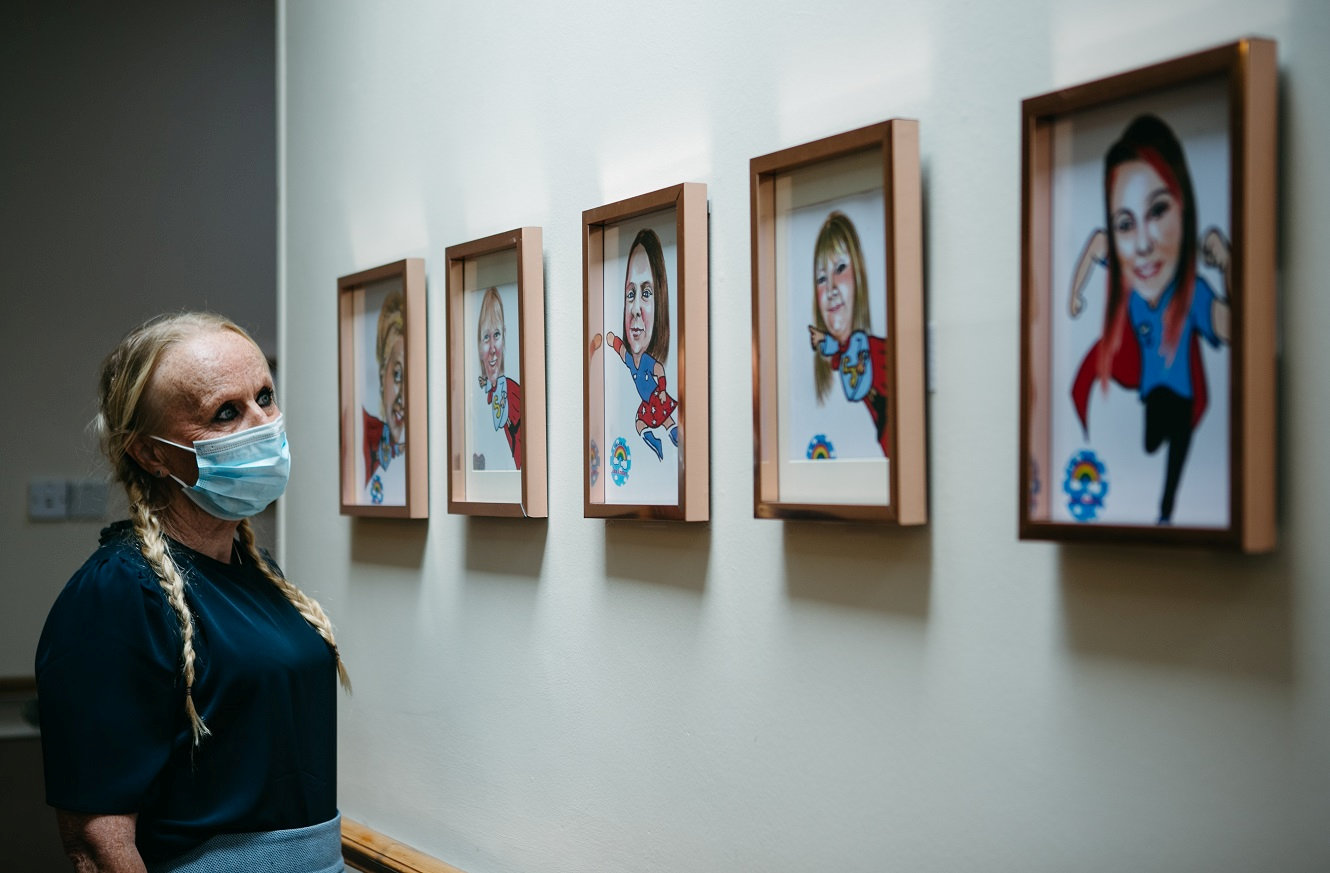 Lynn's paintings hanging on the walls inside Parksprings care home.